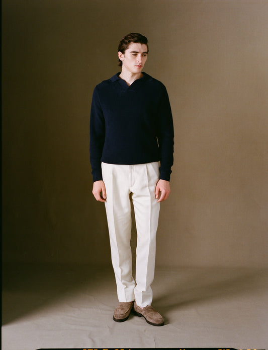 Navy cotton polo knit on model