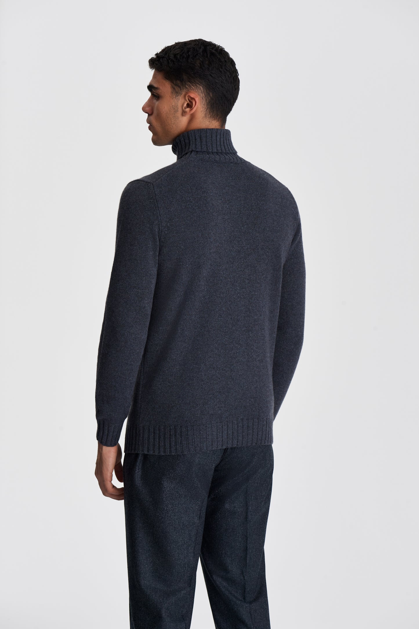 Cashmere Roll Neck Sweater Steel Grey Model Back Cropped Image