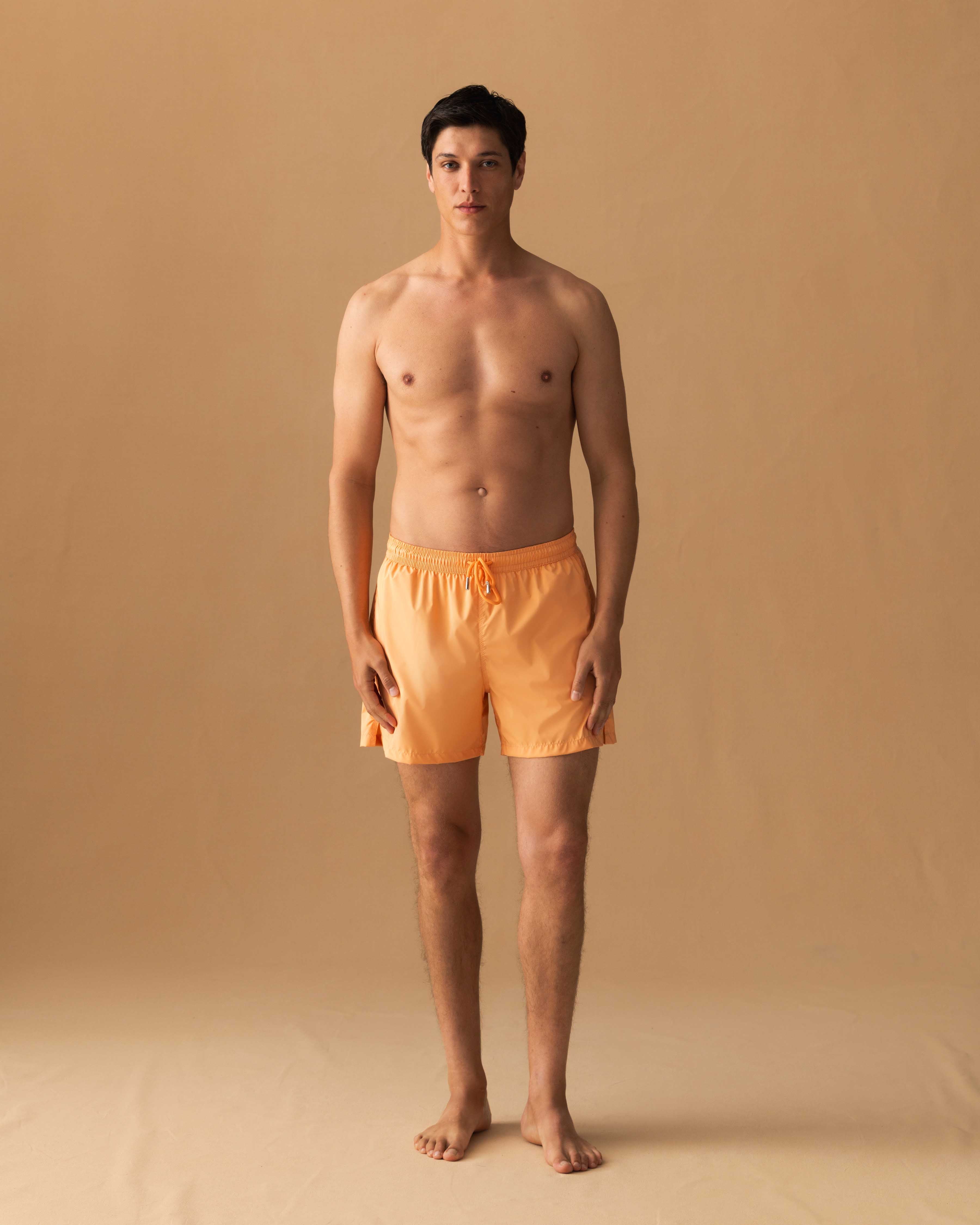 Nylon Mid Length Swim Shorts Orange Model Image