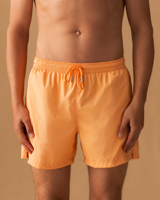 Nylon Mid Length Swim Shorts Orange Model Cropped Image