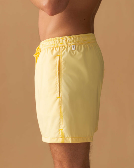 Nylon Mid Length Swim Shorts Yellow Side Model Image