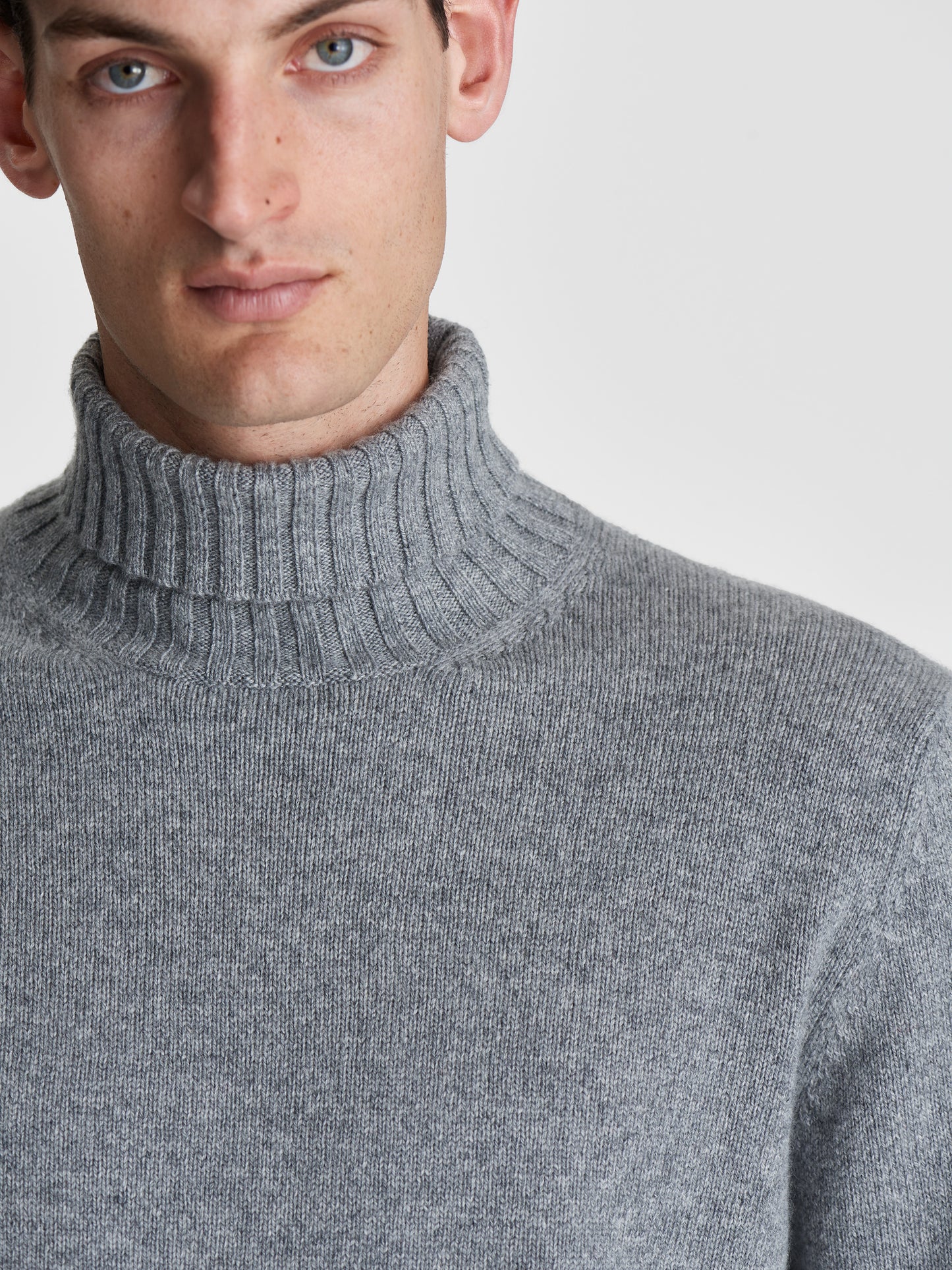Cashmere Roll Neck Sweater Grey Detail Model Image