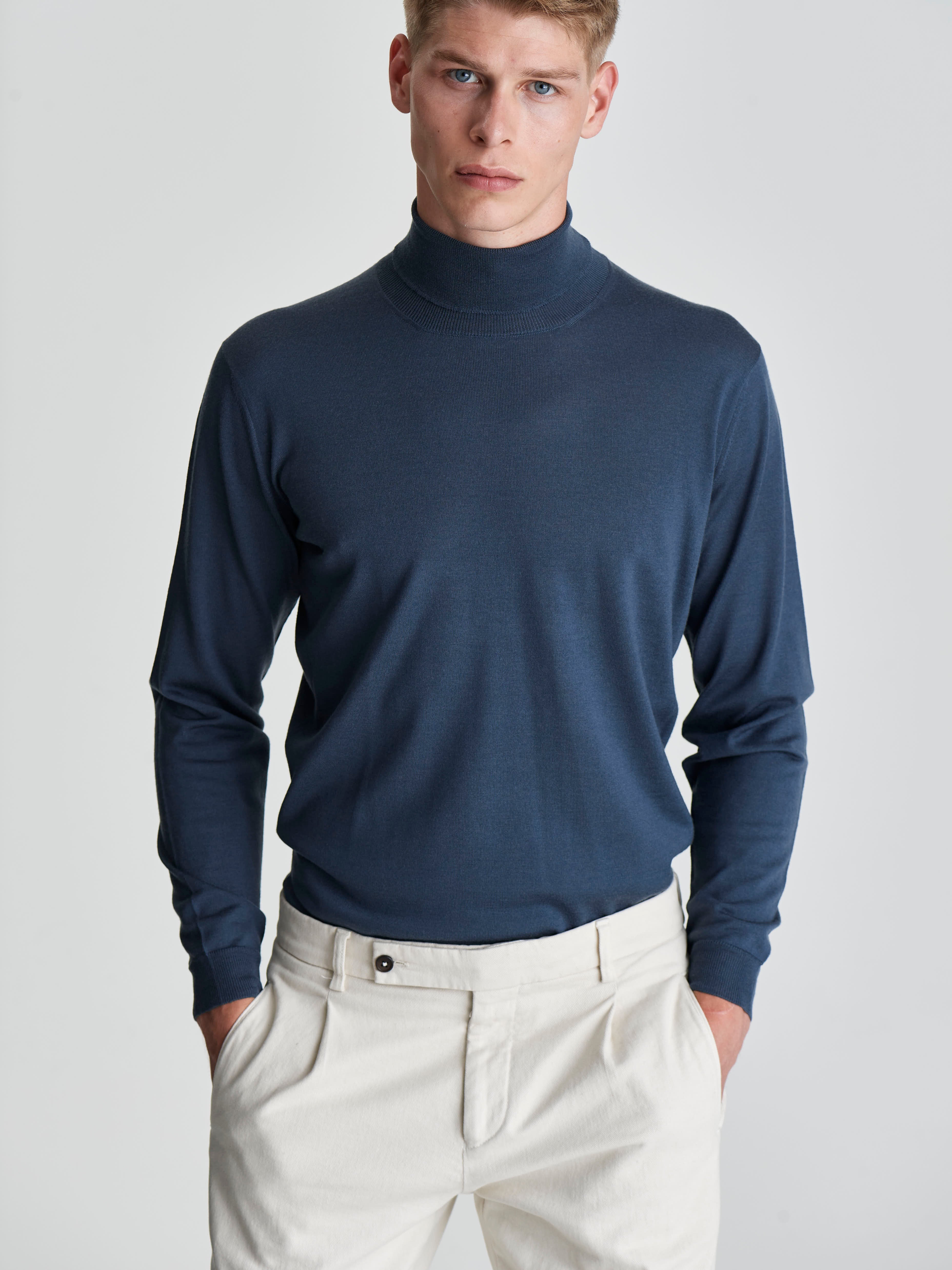 Merino Wool Extrafine Roll Neck Sweater Slate Blue Cropped Model Image