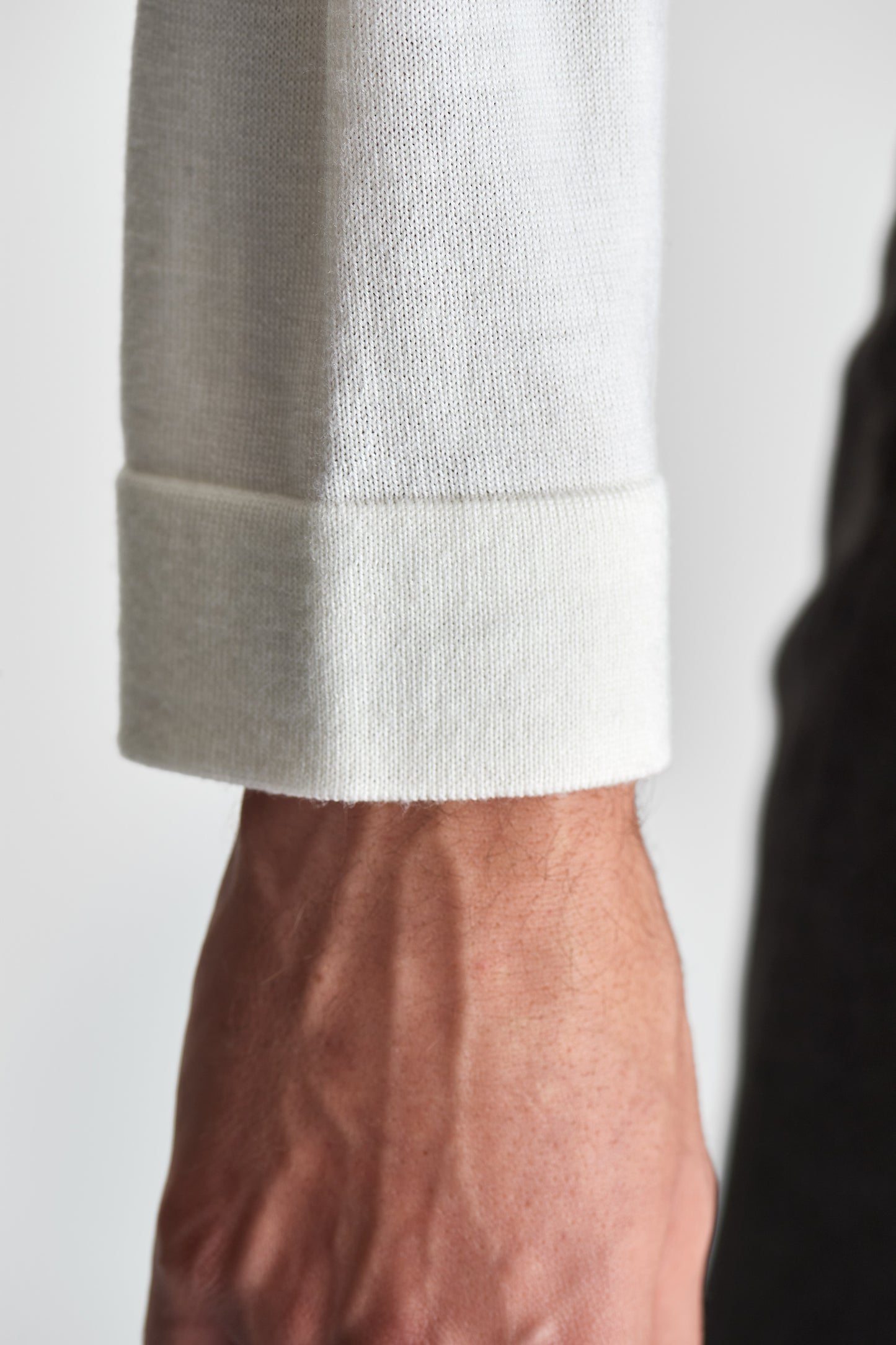 Merino Wool Extrafine Long Sleeve Button Through Polo Shirt Off White Model Sleeve Image