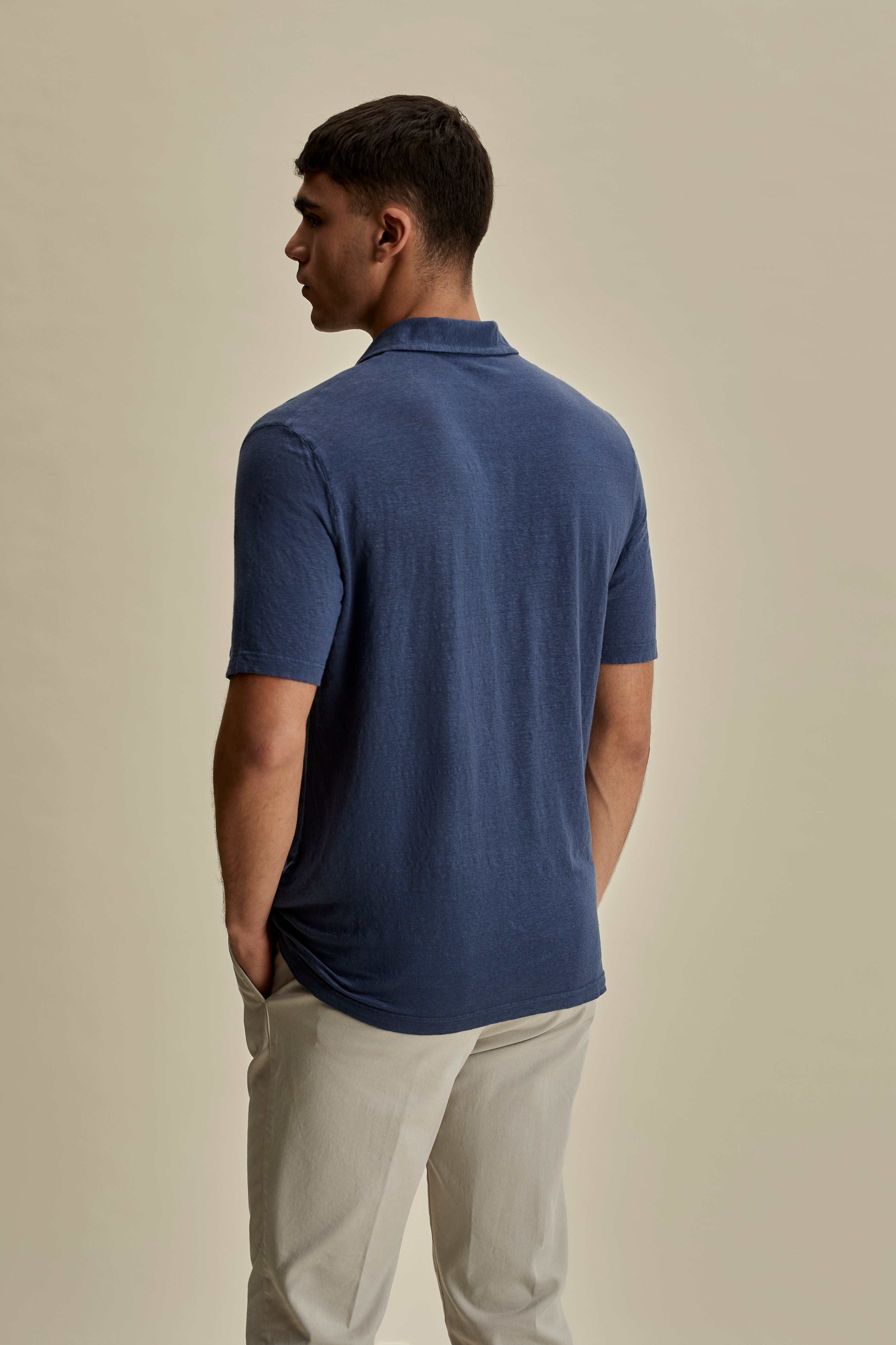 Linen Skipper Polo Shirt Denim Back Mid Crop Model Image