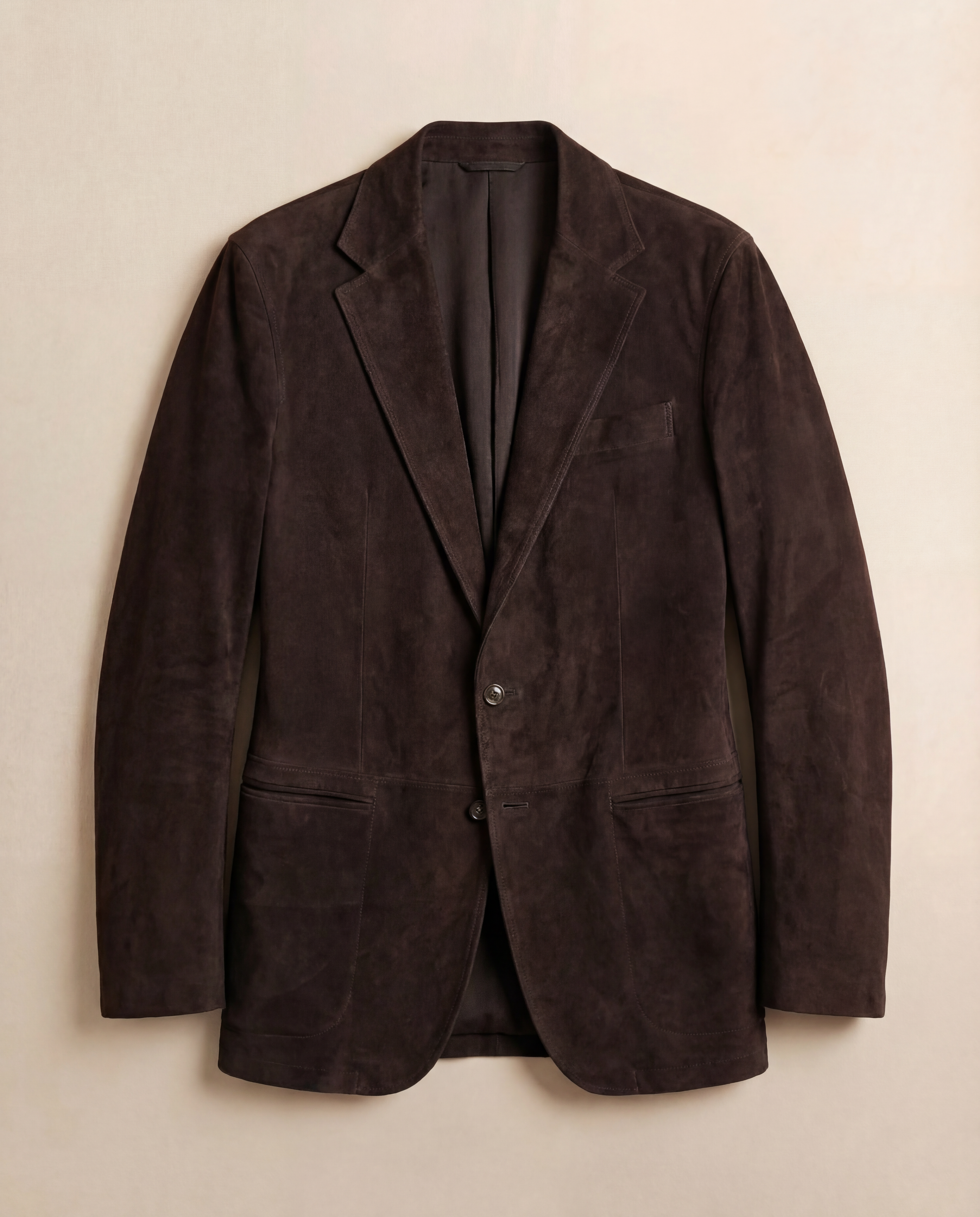 Brown blazer on a beige background