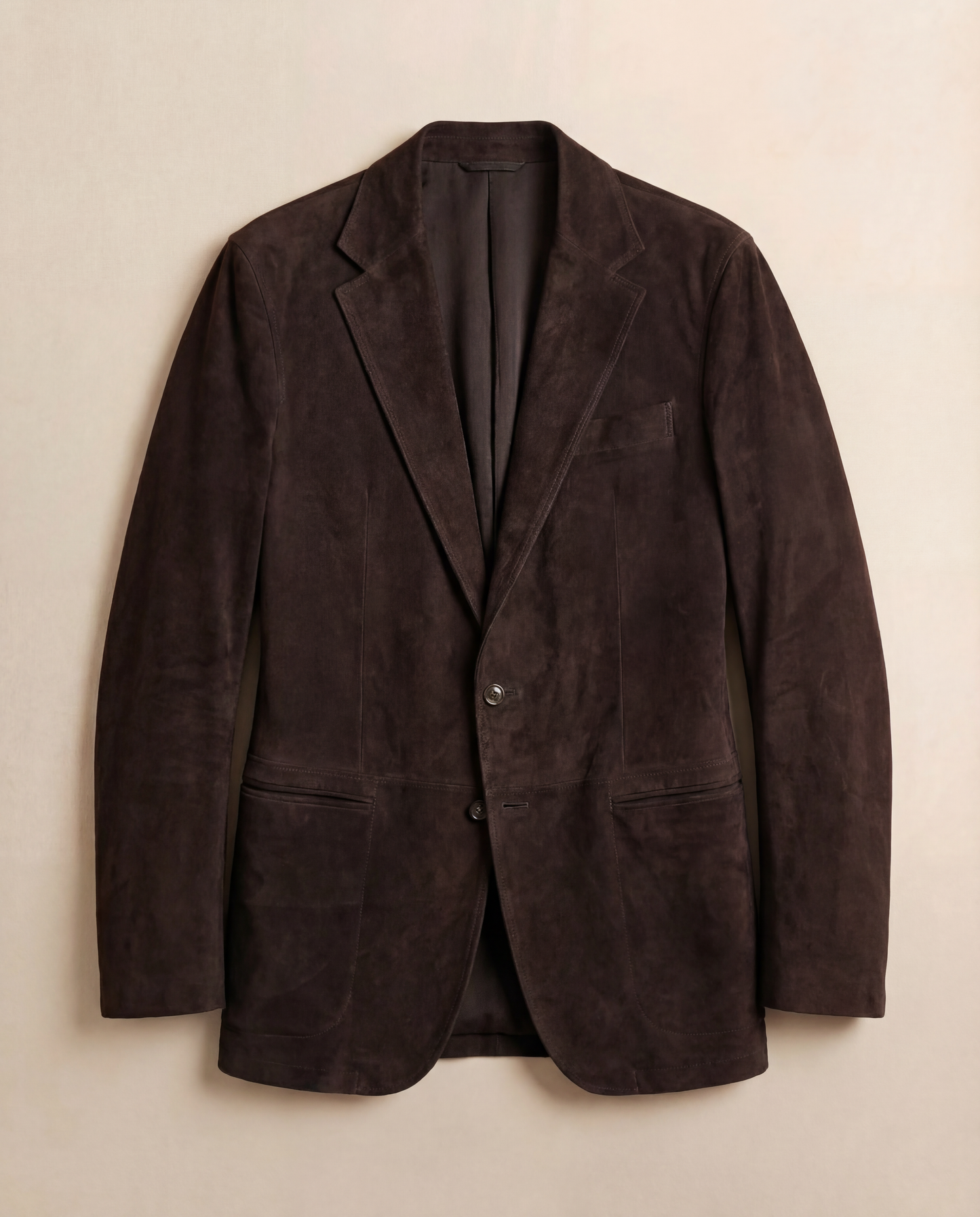 Brown blazer on a beige background