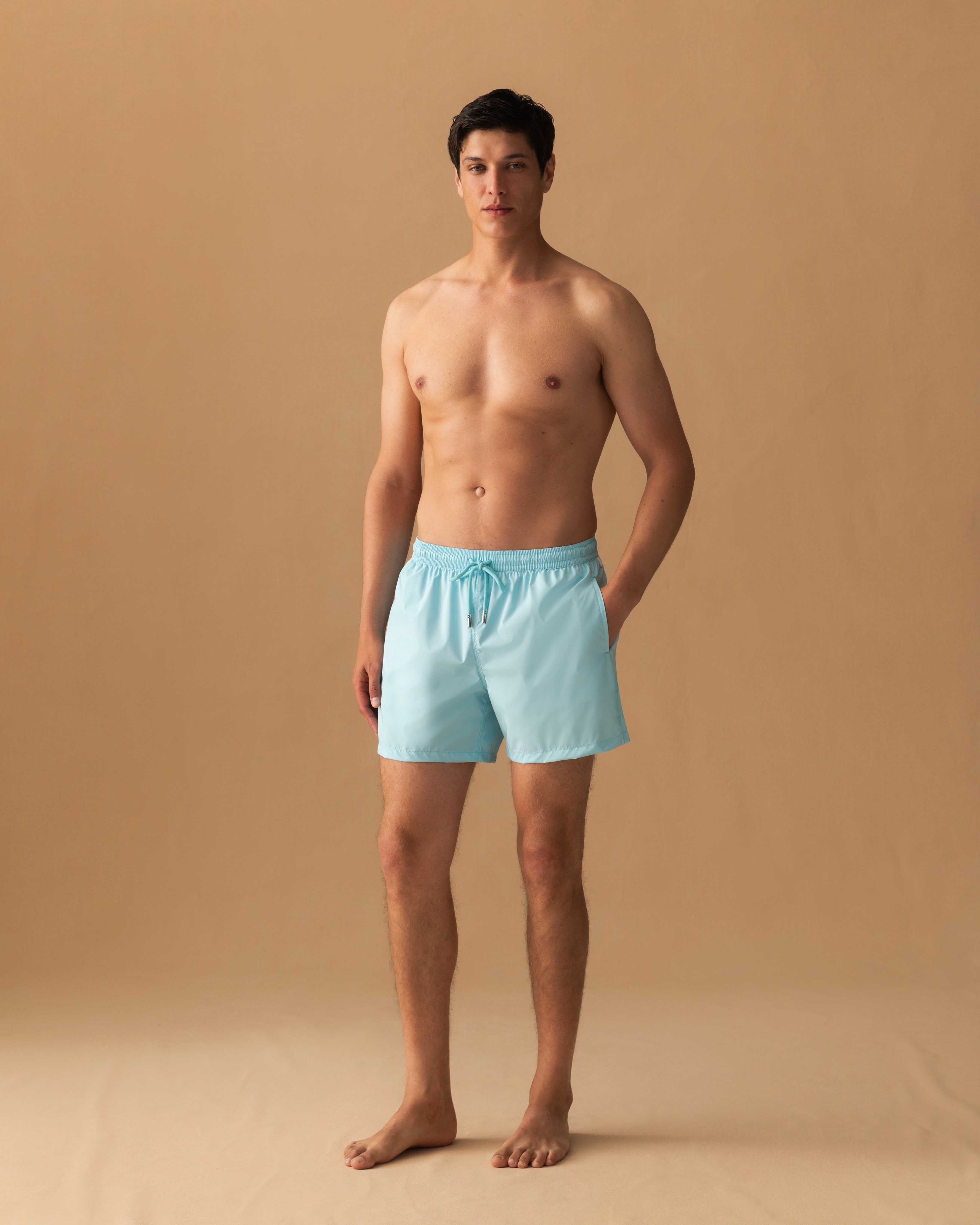 Nylon Mid Length Swim Shorts Blue Model Image